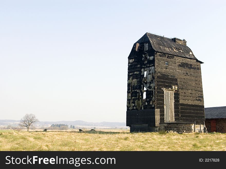 An old windmill standing in a field, has no wings, its condition is bad. Clear blue sky, useful copy space.

<a href='http://www.dreamstime.com/wind-power-with-a-difference.-rcollection4317-resi208938' STYLE='font-size:13px; text-decoration: blink; color:#FF0000'><b>WIND TURBINES WITH DIFFERENCE »</b></a>. An old windmill standing in a field, has no wings, its condition is bad. Clear blue sky, useful copy space.

<a href='http://www.dreamstime.com/wind-power-with-a-difference.-rcollection4317-resi208938' STYLE='font-size:13px; text-decoration: blink; color:#FF0000'><b>WIND TURBINES WITH DIFFERENCE »</b></a>