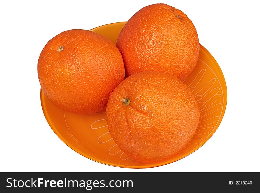 Oranges in a plate