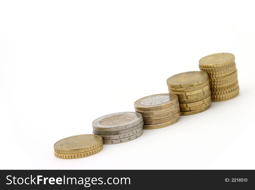Stacks coins on white background