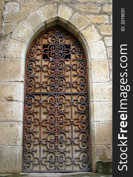 Photograph of a Gothic style Medieval door in France. Photograph of a Gothic style Medieval door in France.