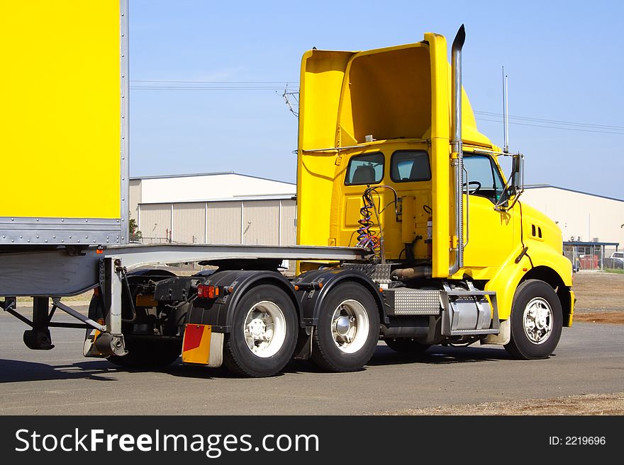 Articulated semi truck in industrial site