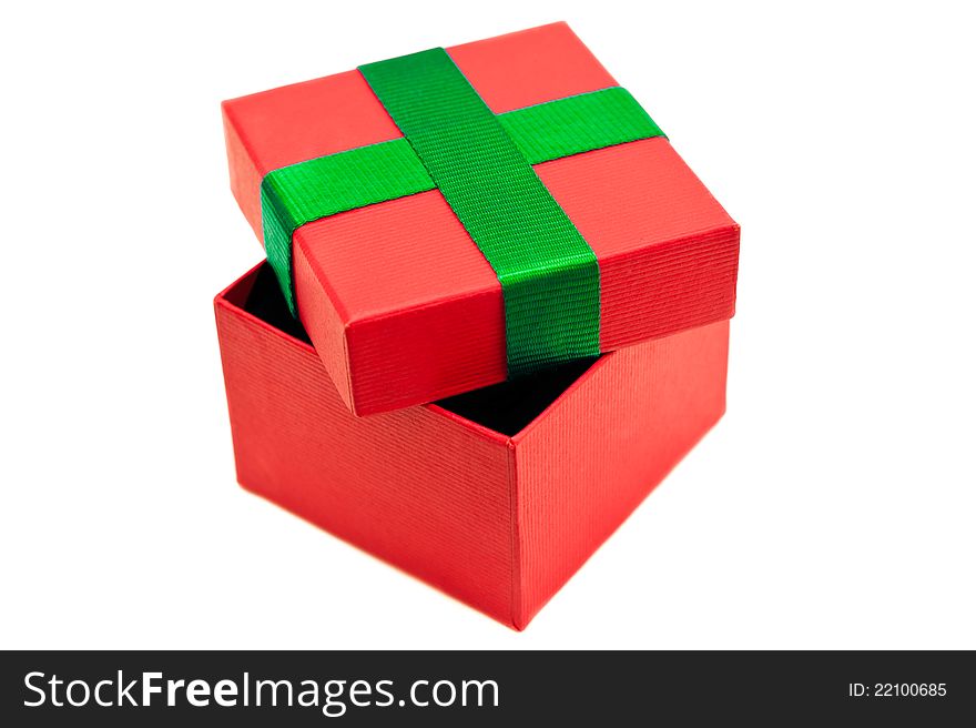 Isolated red green present box over white