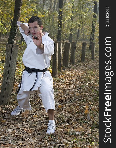 Karate training with nunchaku-spinning. Karate training with nunchaku-spinning