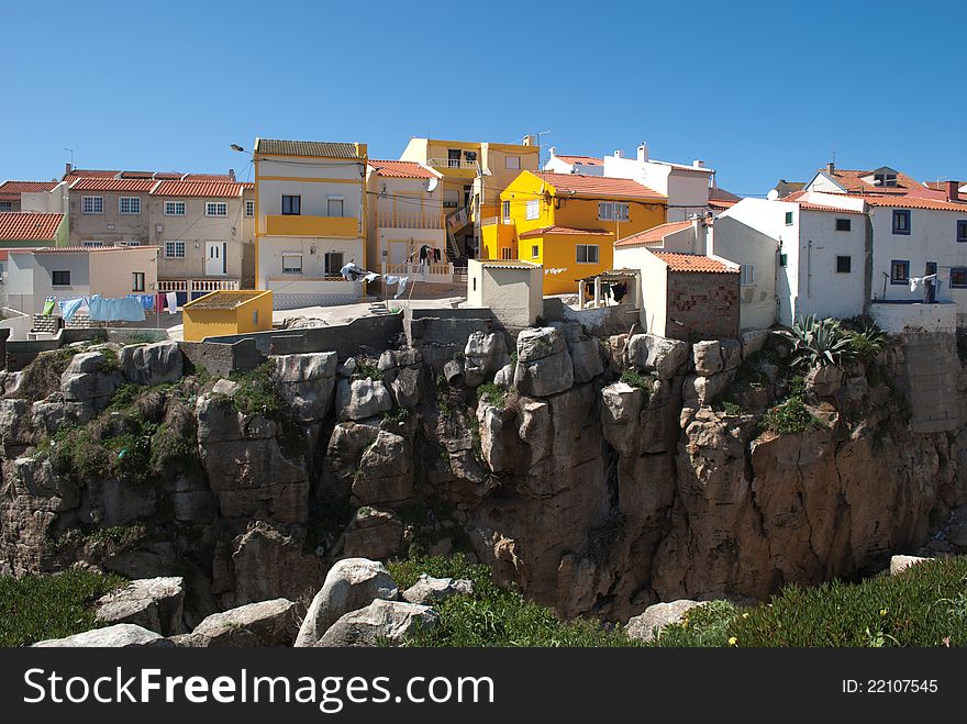 Colored houses in the rocks edge