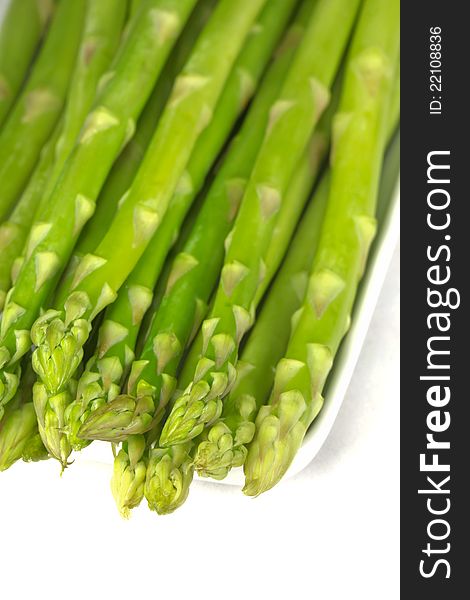 Green Asparagus On A White Background.