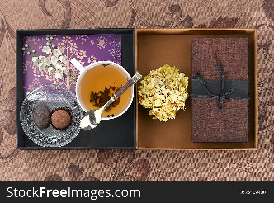 Decoration box with tea cup chocolate and brown box image for restaurant decorates. Decoration box with tea cup chocolate and brown box image for restaurant decorates