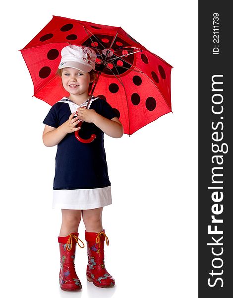 The little girl with an umbrella and in rubber boots. on a white background