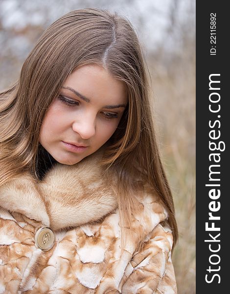 Young Woman In A Fur Coat