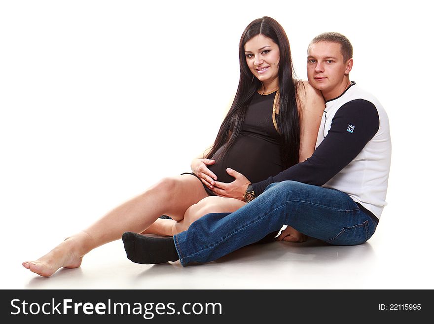 Portrait of happy pregnant women with husband on white background. Portrait of happy pregnant women with husband on white background