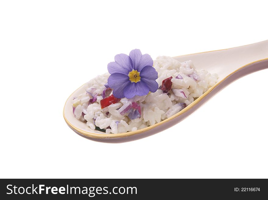Rice with cheese and flower petals on white background. Rice with cheese and flower petals on white background