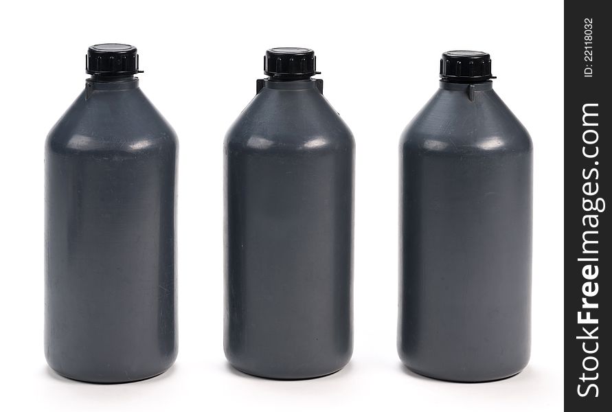 Black plastic bottle on a white background