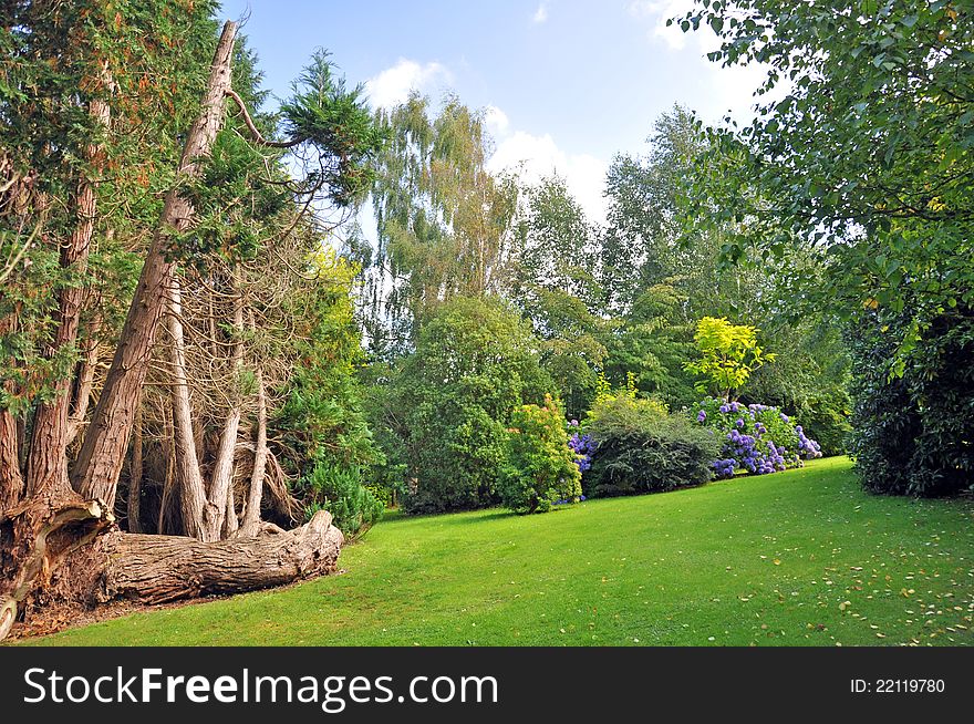 The parkland garden of a large english country house