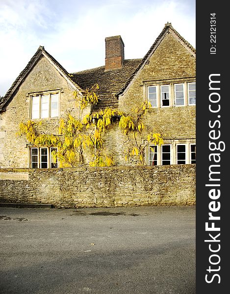 English cottage in a sunny autumn day