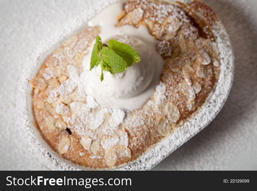 Baked apple pie with ice cream and mint. Baked apple pie with ice cream and mint