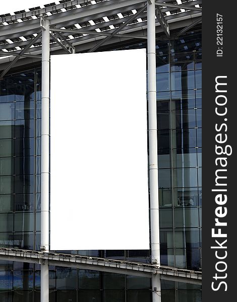 Hanging blank billboard on glass curtain wall of the exhibition hall.