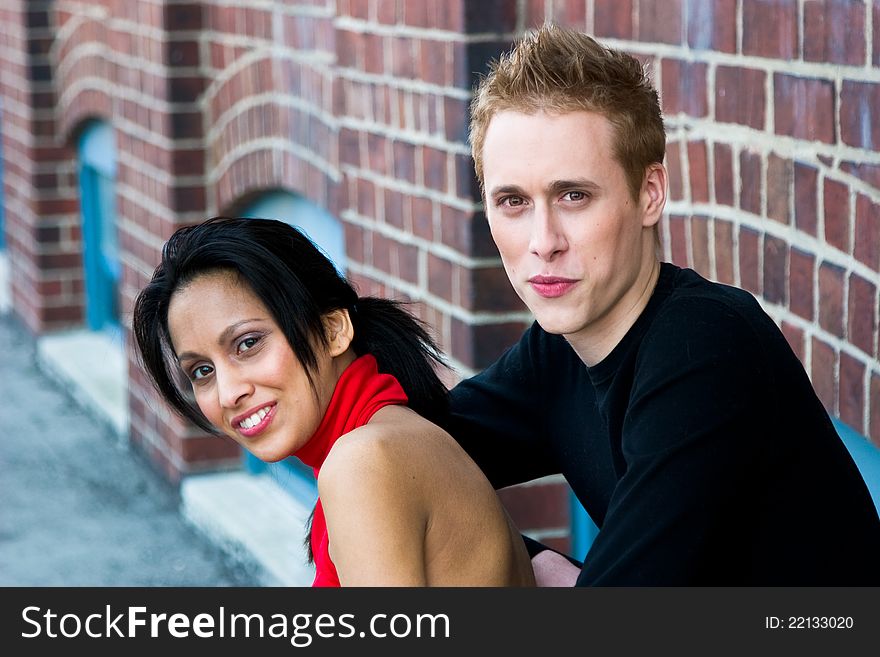 Smiling East Indian woman and caucasian man