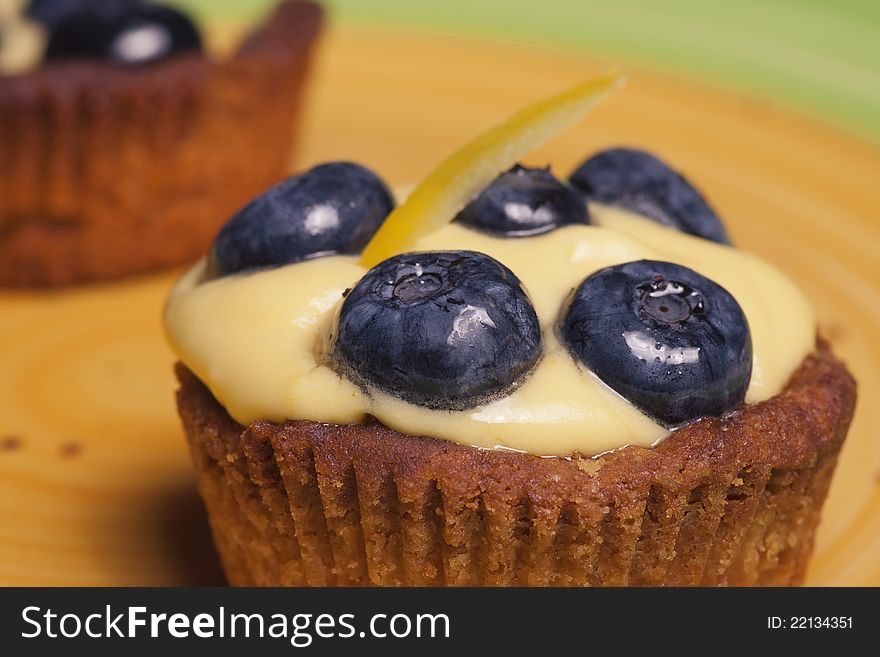 Close-up of cake with fresh bilberries, selective focus. Close-up of cake with fresh bilberries, selective focus.