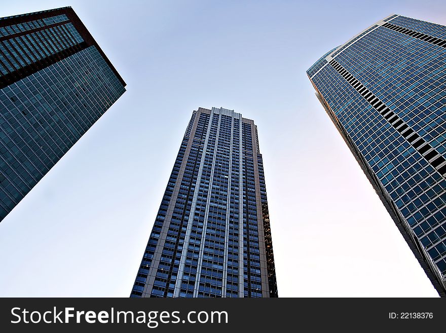 Three skyscrapers stand tall in the skies of Chicago. Three skyscrapers stand tall in the skies of Chicago