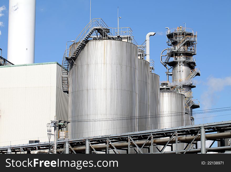 Refinery plant with tanks and cooling towers