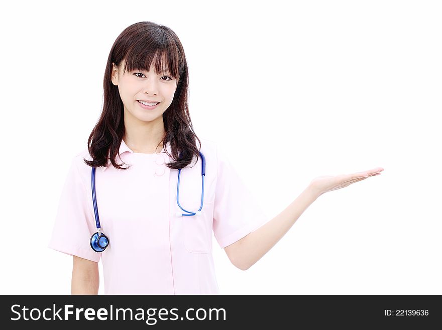 Young asian female nurse hand showing blank sign