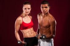 Strong Young Couple Working Out With Dumbbells Stock Photography Strong Young Couple Working Out With Dumbbells Stock Photography