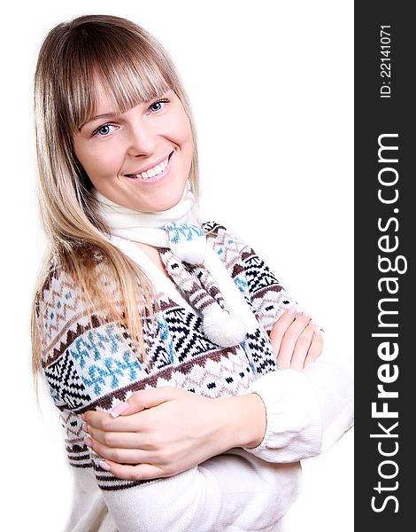 Beautiful young smiling woman in a knitted sweater. Beautiful young smiling woman in a knitted sweater