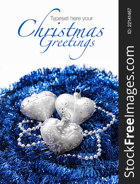 Silver Christmas hearts on blue