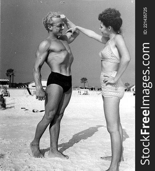 Phil King Shows His Muscles To Leatrice Jackson, Of Hueytown, Ala. - Panama City Beach