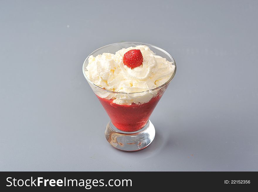 Strawberry puree with wipped cream. Strawberry puree with wipped cream