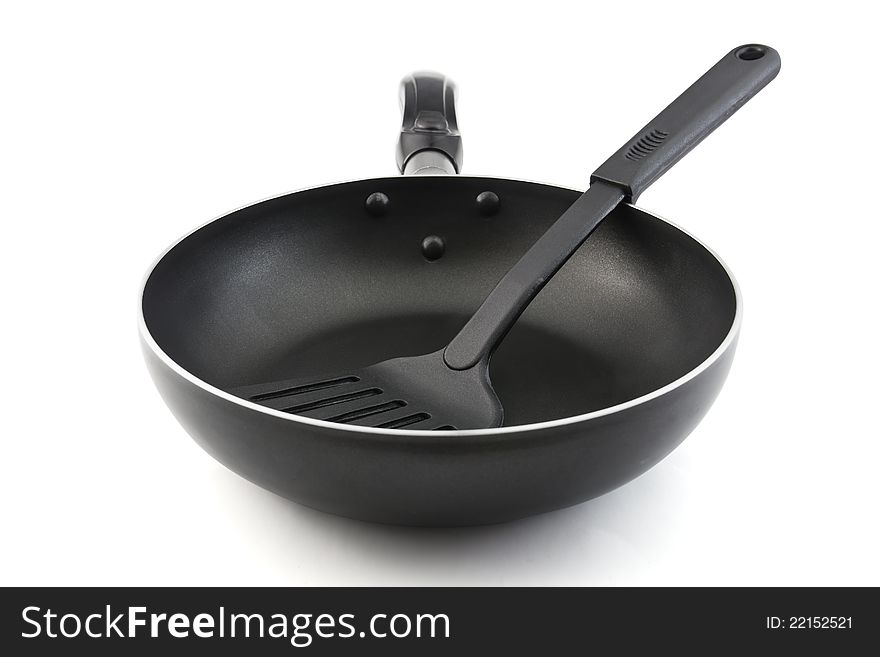 Pan with handle and Spade of frying pan on white background