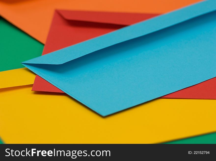 A pile of colored envelopes background