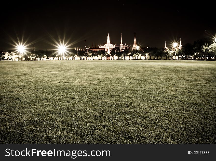 Widely public park with green grass in reduce color mode.