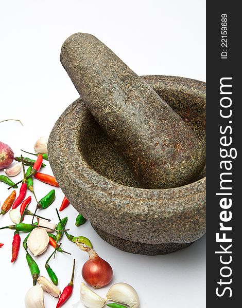 Stone mortar with pestle - Thai cooking tool on white background