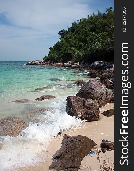 Blue ocean cliff and beach with rocks. Blue ocean cliff and beach with rocks