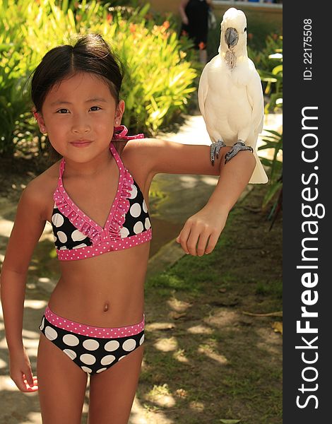 Chinese Girl Holding Bird