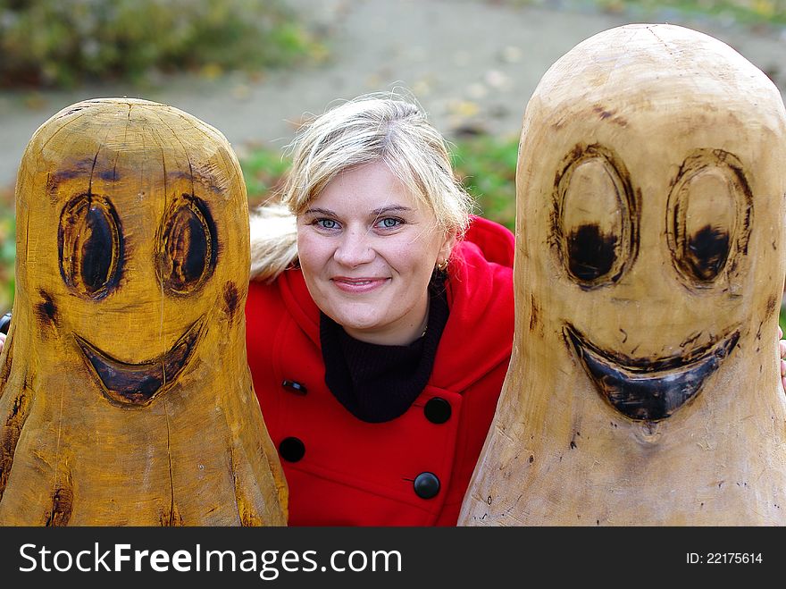 Beautiful girl with blond hairs enjoying autumn