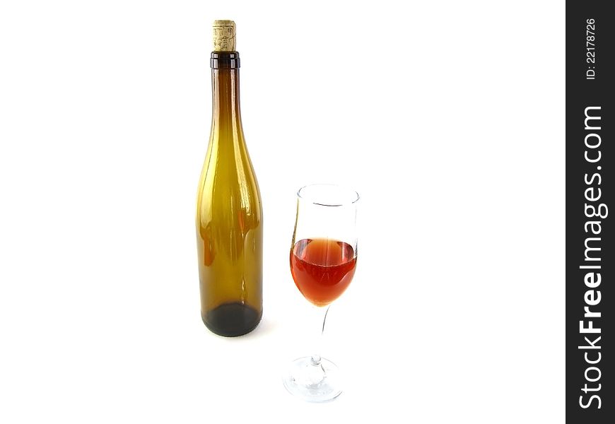 Bottle and glass of red wine isolated on a white background