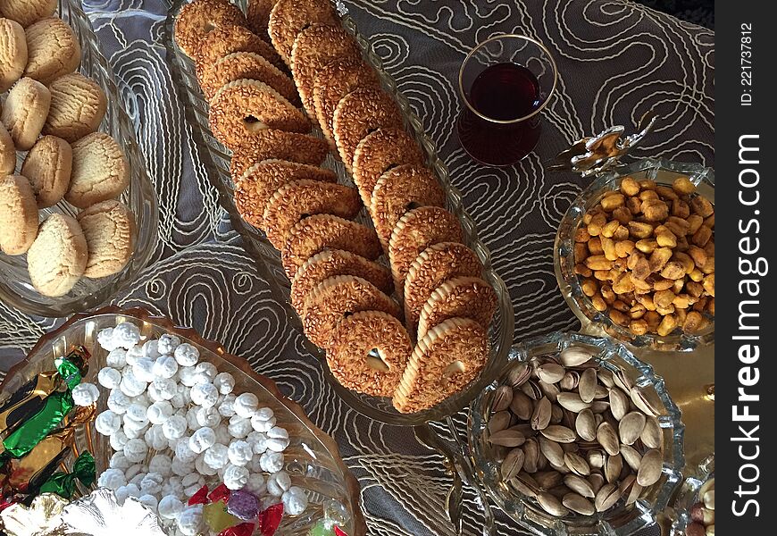 Tasty Dry fruits and cookies in plate