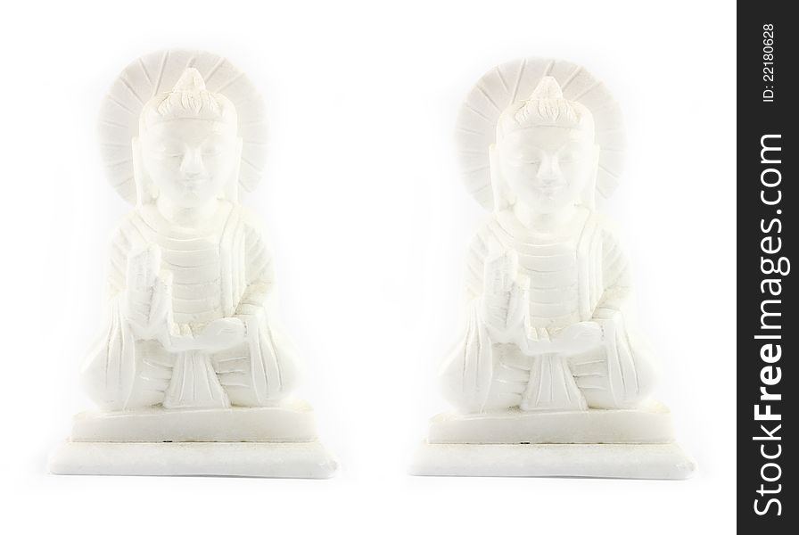 White Buddha stone carving on white background