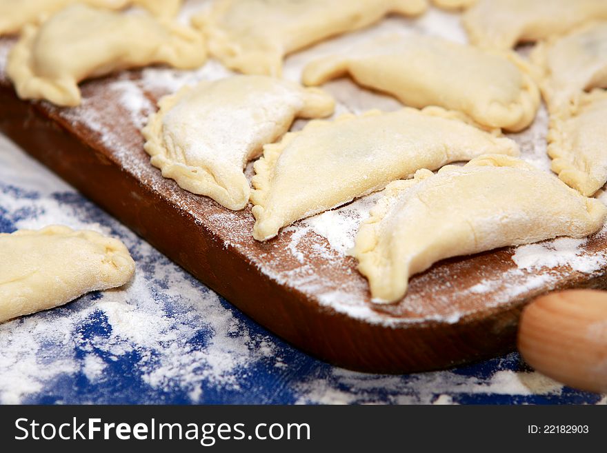 Raw Ukrainian traditional dumplings close up. Raw Ukrainian traditional dumplings close up