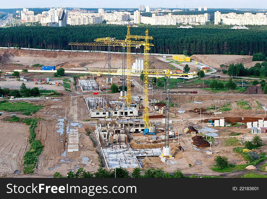 Birds eye view of the large construction site. Birds eye view of the large construction site