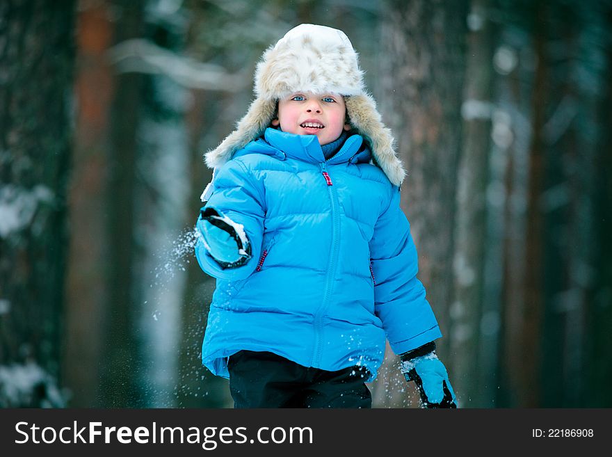 Portrait Of A Little Boy Playing Outdoors