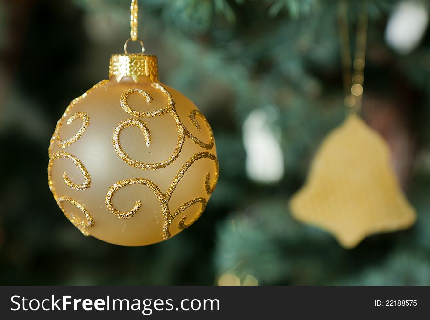 Christmas ornament hanging from the pine