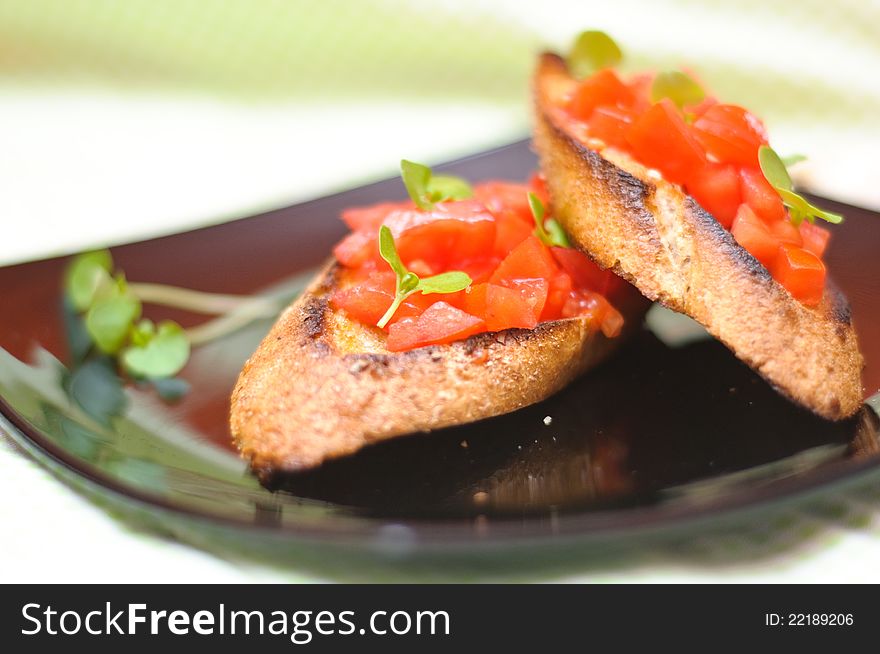 Traditional italian bursquettes with tomato, garlic and basil. Traditional italian bursquettes with tomato, garlic and basil