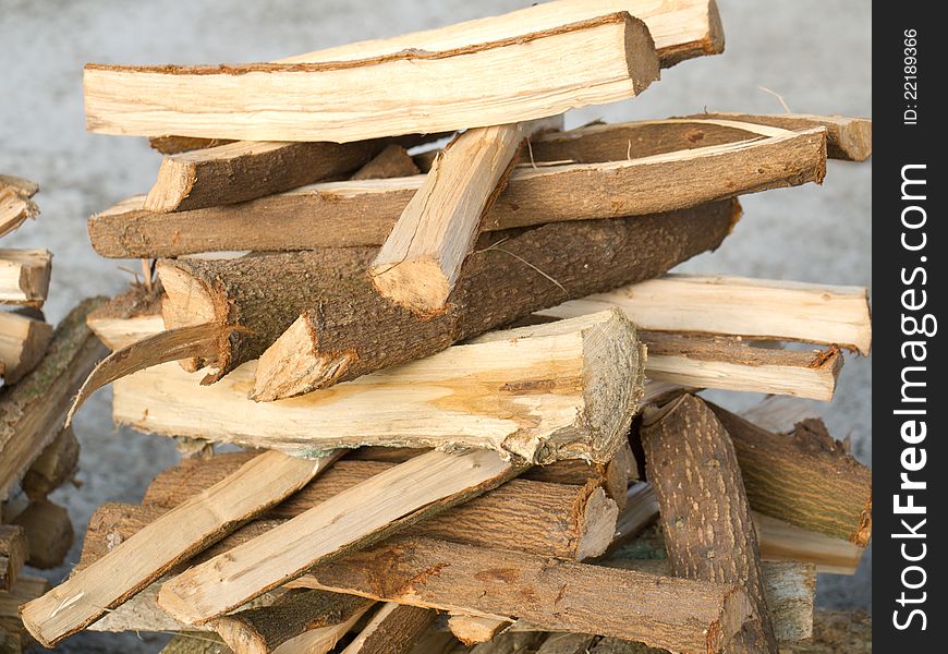 Natural raw chopped firewood pile. Natural raw chopped firewood pile