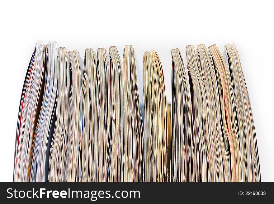 Pile Of Magazines On White Background