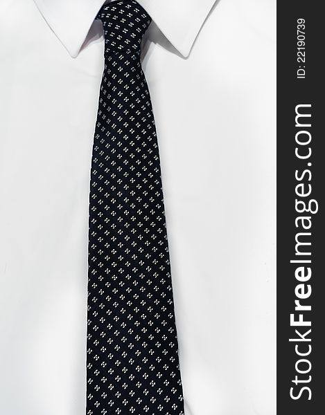 Blue neck tie in white shirt