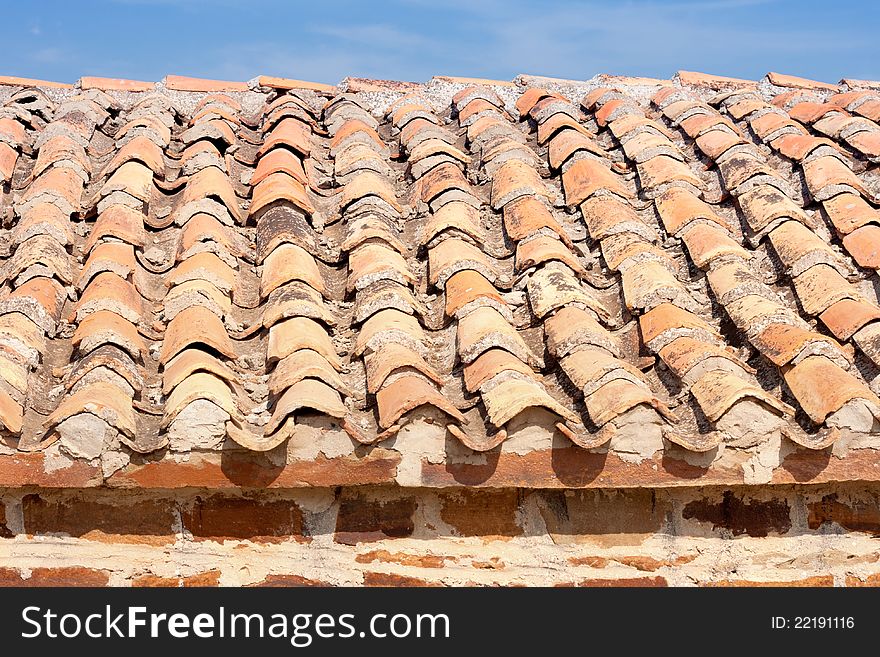 Old red and orange roof tiles. Old red and orange roof tiles