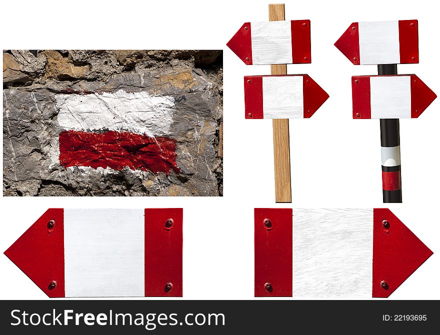 Five red and white signposts for paths in Italy