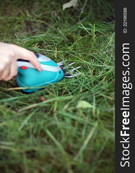 Cutting grass on home garden. Cutting grass on home garden.